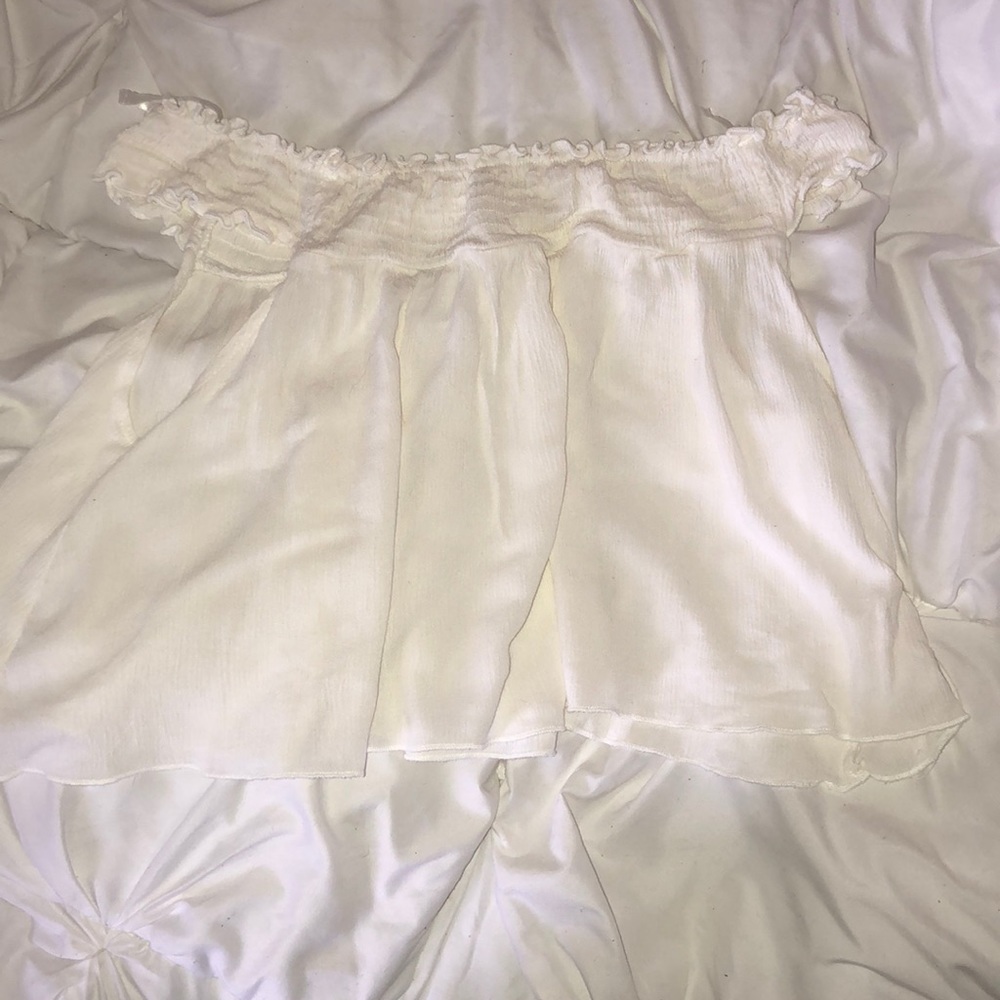 White ruffled tank